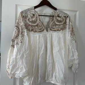 White balloon sleeve embroidered blouse